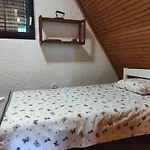 Mala Kuca, *